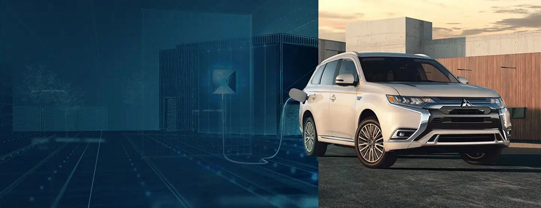 2021 Outlander Plug-in Hybrid plugged in to a charger - Mitsubishi has focused on Plug-in Hybrid Electric Vehicle technology—pushing the boundaries of what’s possible with hybrids